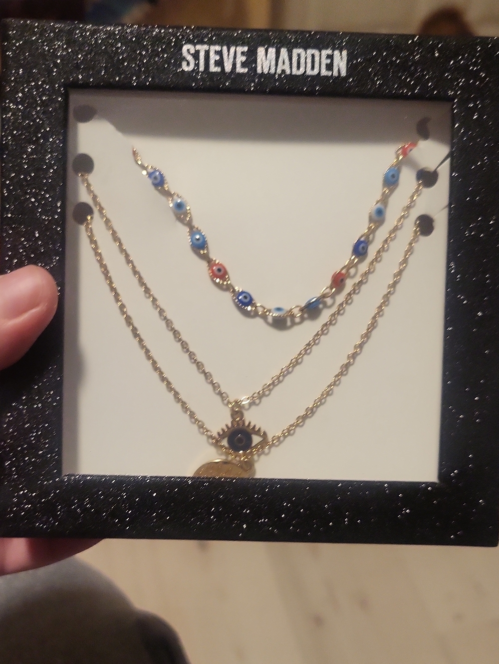 Steve Madden Gold Layered Necklace Set with Blue and Red Eye Charms